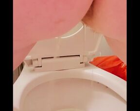 Standing slow piss with backside view